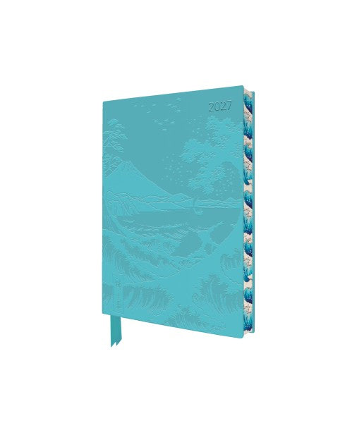 Turquoise planner with a scenic design on a white background