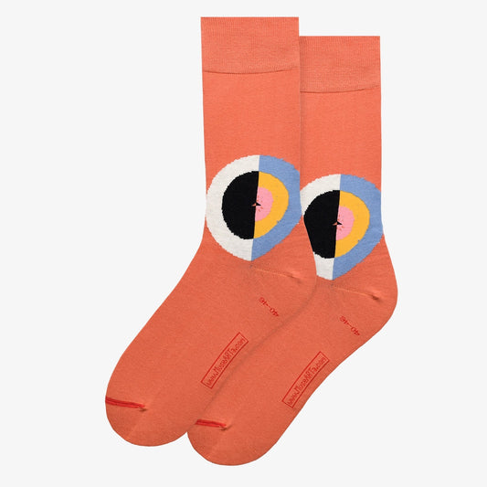 Red Socks with an abstract design on a white background