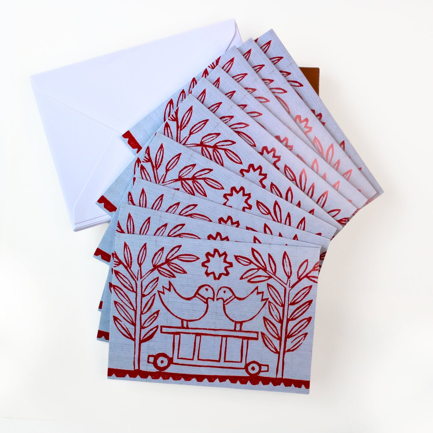 An open box showing 10 National Gallery of Ireland Christmas cards featuring George Wallace's Yellow with Red Birds, and 10 envelopes.