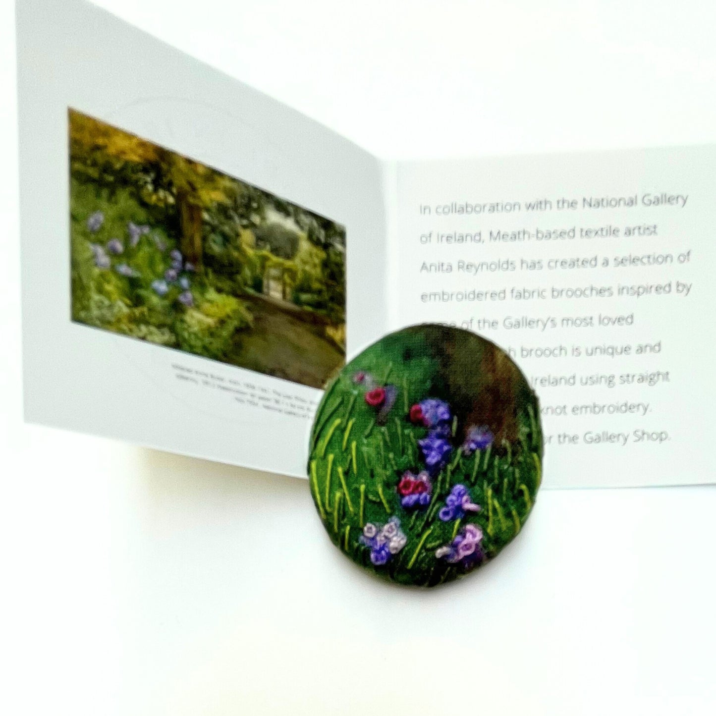 Anita Reynolds brooch based on Butler's Lilac Phlox, Kilmurry next to its insert card