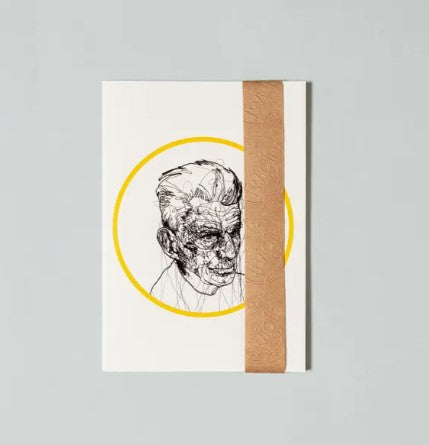 white notebook featuring a sketchy style drawing of Samuel Becket in the middle, inside a yellow circle