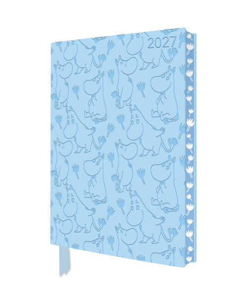A light blue 2027 spiral-bound planner featuring a repeating line-art pattern of Moomin characters, shown on a plain white background.