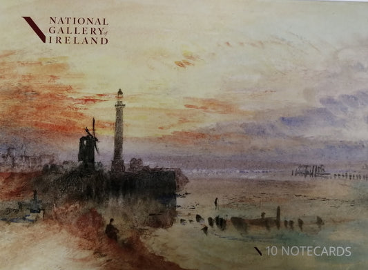 The pack cover is a vibrant watercolour of beachside scene at sunset. A lighthouse and windmill are silhouetted in black against an orange and purple sky.