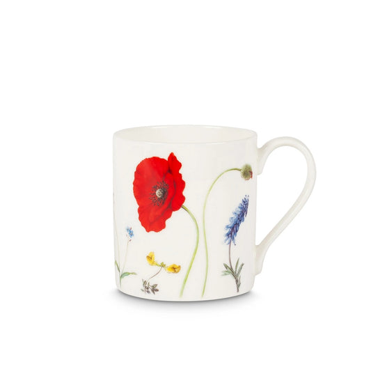 A white mug with life like illustrations of wild flowers including bluebells and a large red poppy.