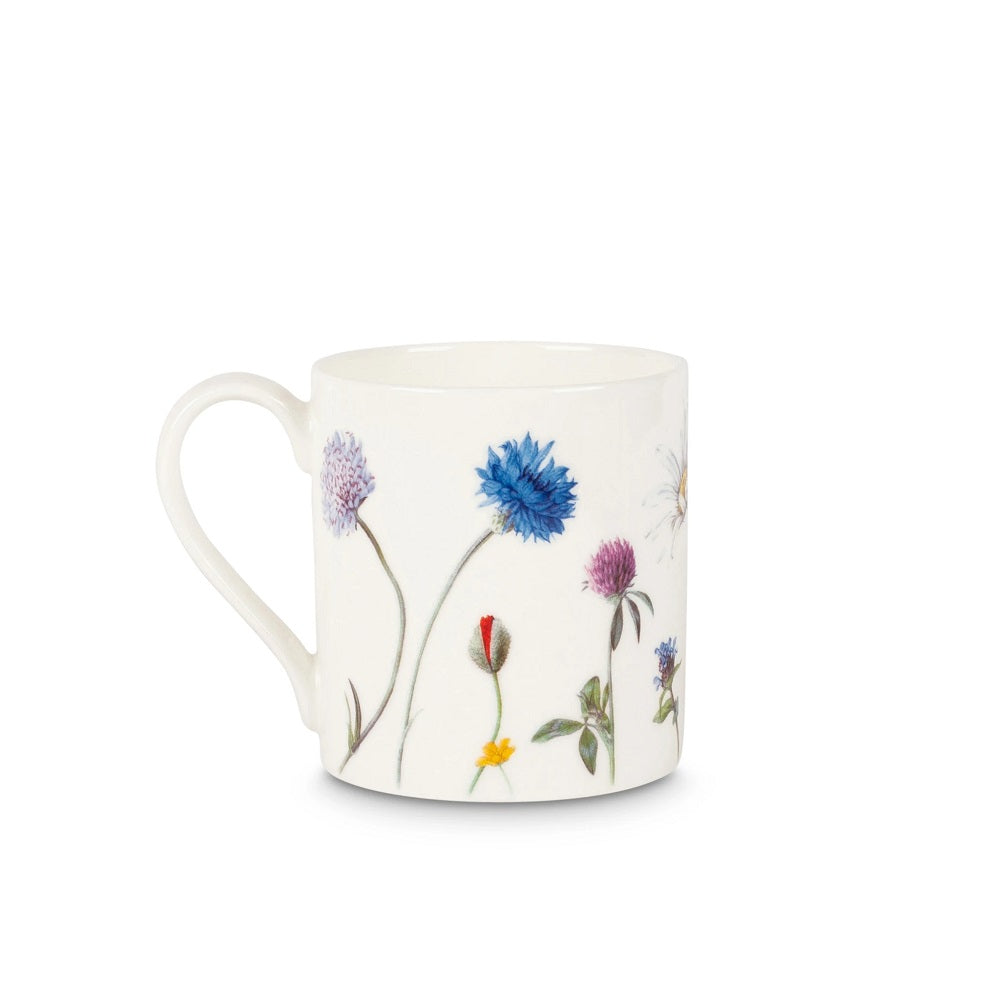 The floral illustrations continue around the cup including honeysuckle and cornflower.